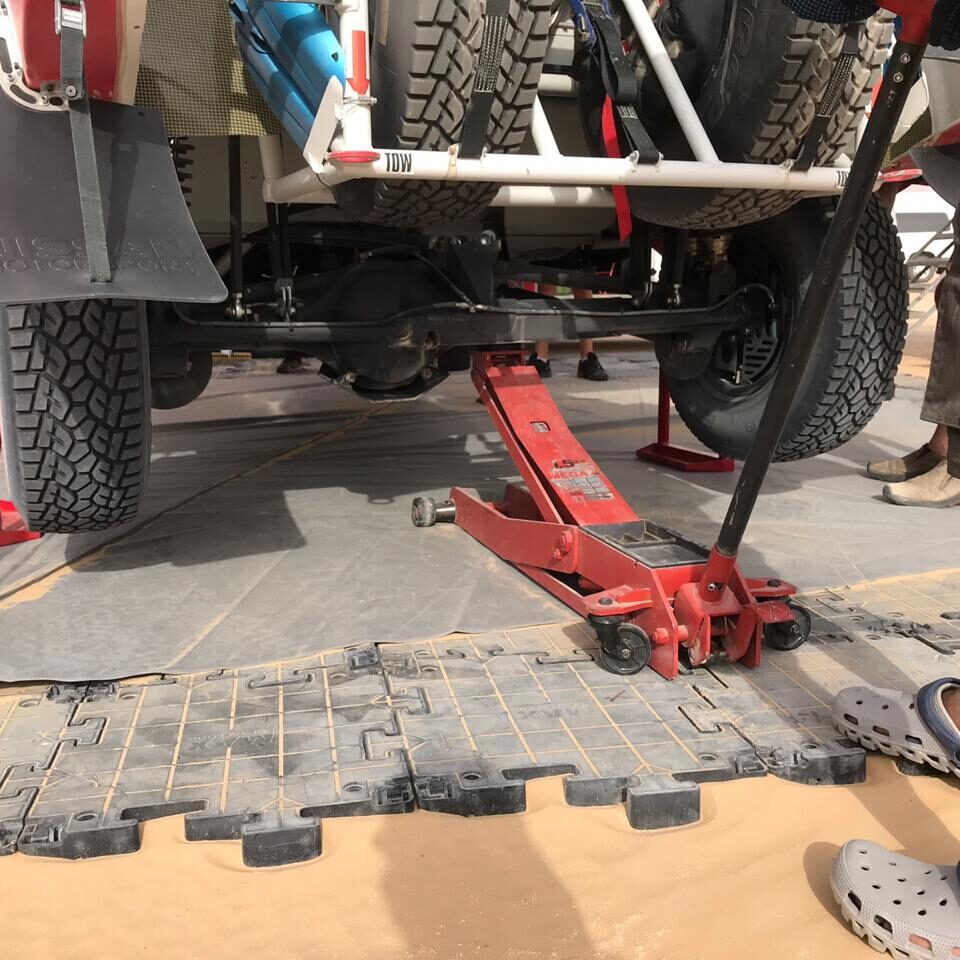 Desert vehicle maintenance pad with jack Abu Dhabi UAE
